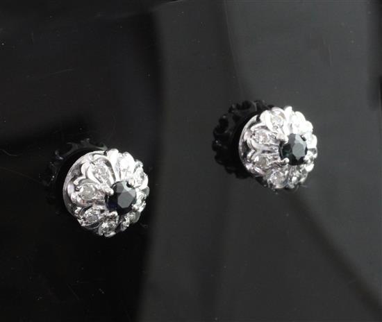 A pair of modern white gold, sapphire and diamond cluster earrings, 11mm.